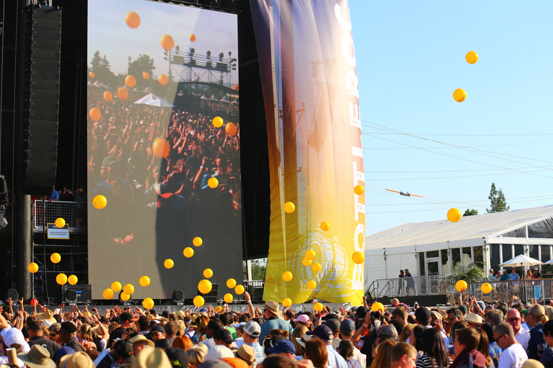 Yellow balloons going up at BottleRock festival