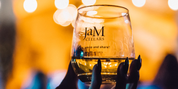 Glass of JaM Cellars wine