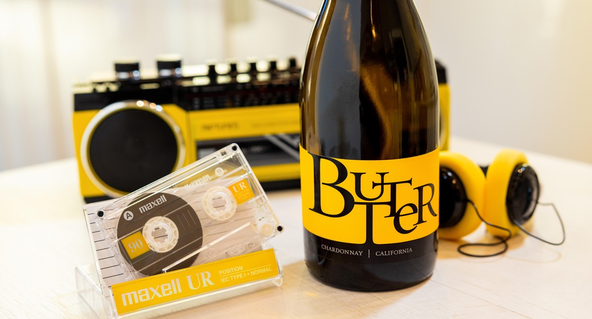 Music casette tape with bottle of JaM Cellars Butter